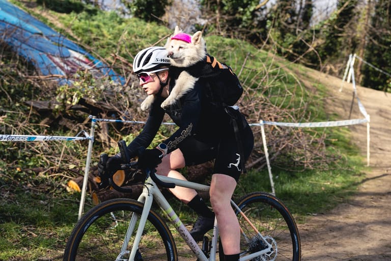 Honor Elliott and Picasso, the dog who raced cyclocross